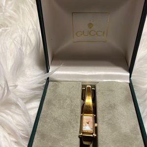 VINTAGE  GUCCI  GOLD WATCH ‘ Bango Style good condition Facing Mother Pearl